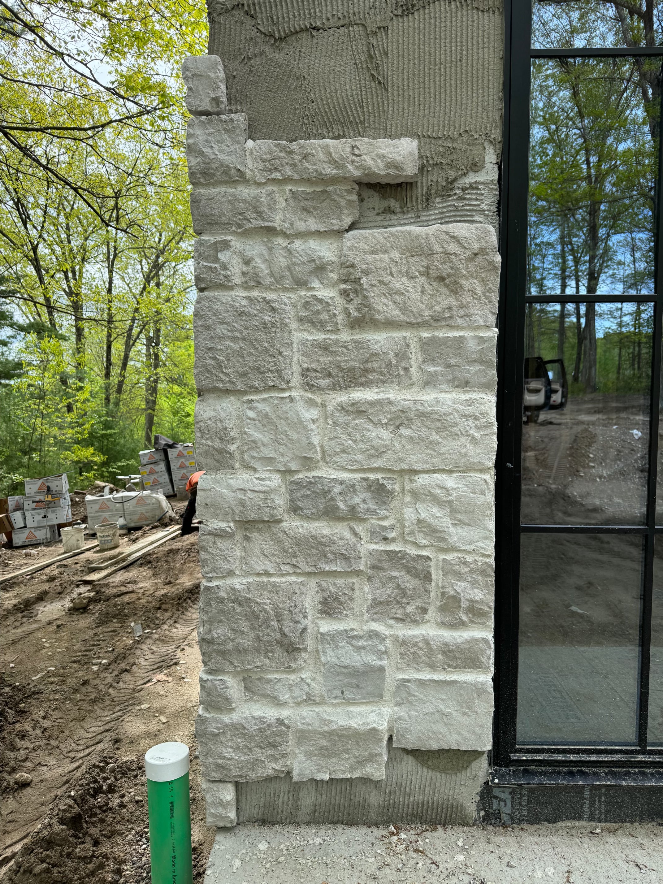 Steel Windows & Doors Paired with Stone Siding: Elevating Your Home's Design